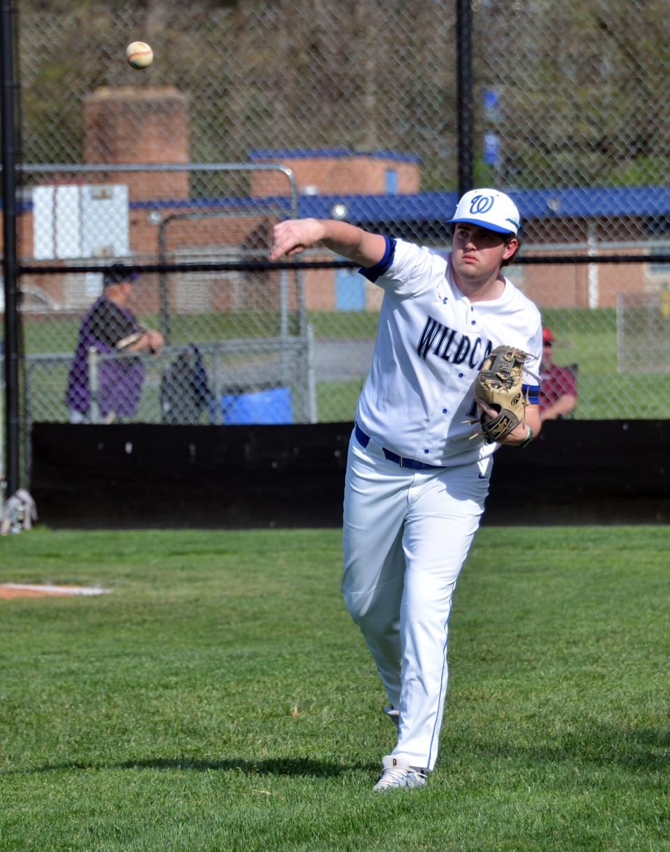 Williamsport's Matthew Downs plays catch with a teammate prior to Monday's game against Smithsburg.