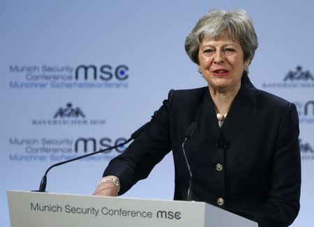 Britain's Prime Minister Theresa May talks at the Munich Security Conference in Munich, Germany, February 17, 2018. REUTERS/Ralph Orlowski