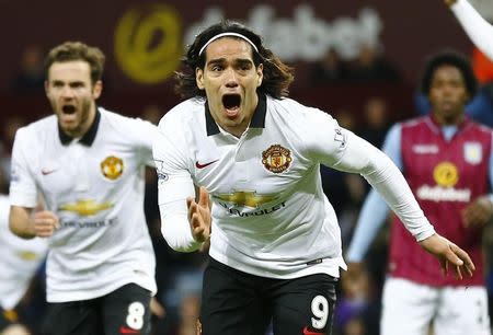 Manchester United's Radamel Falcao celebrates after scoring a goal during their English Premier League soccer match against Aston Villa at Villa Park in Birmingham, central England December 20, 2014. REUTERS/Darren Staples