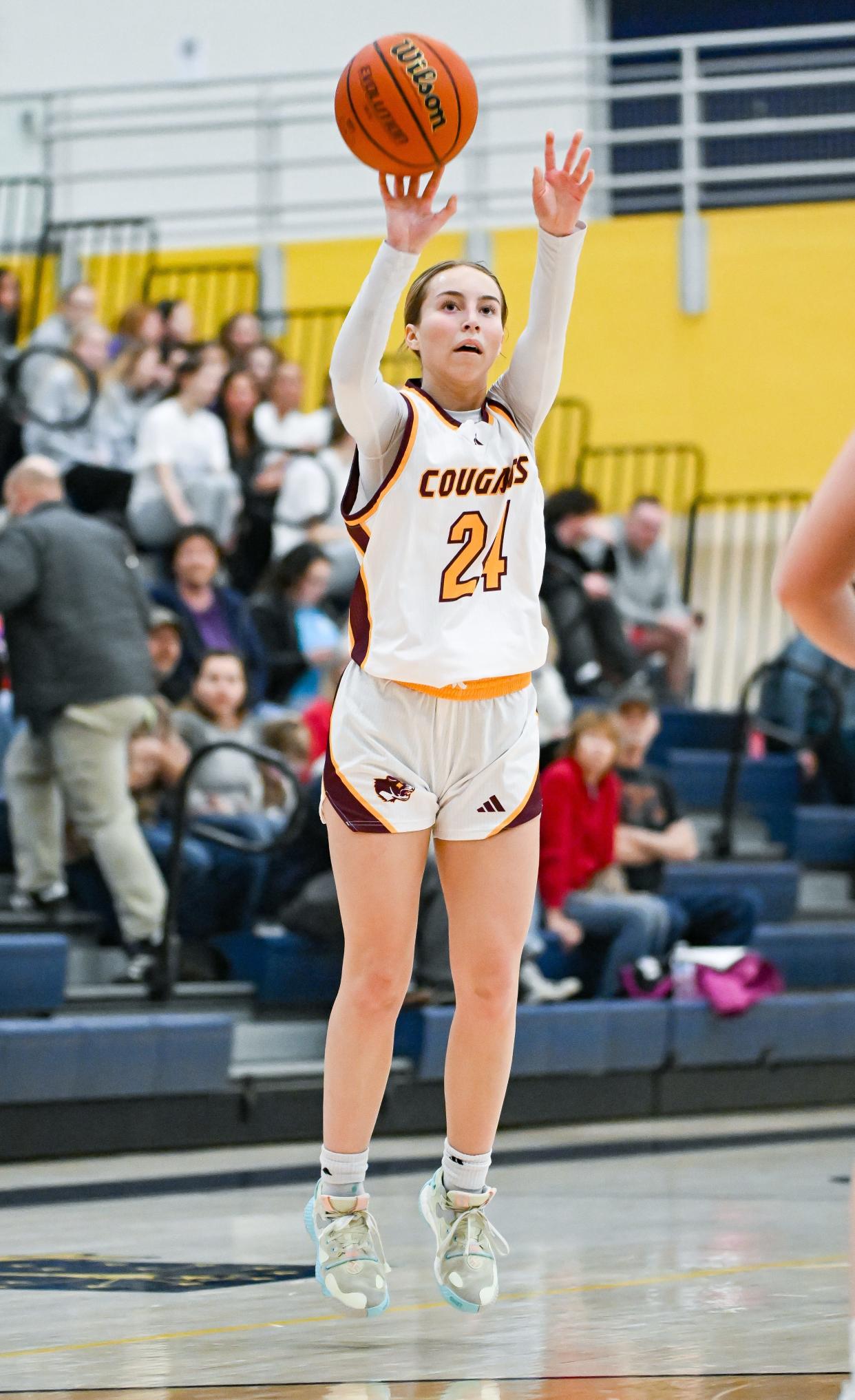 Bloomington North’s Ava Robbennolt (24) attempts a 3-pointer during the IHSAA first round sectional game against Martinsville at Mooresville High School on Tuesday, Jan. 30, 2024.