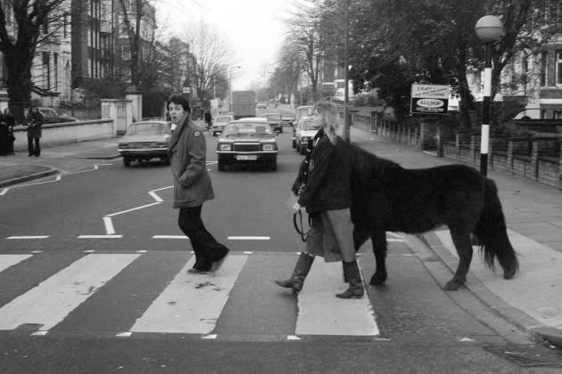 Paul and Linda McCartney in a crosswalk with a pony. (courtesy of MPL) - Credit: Courtesy of MPL