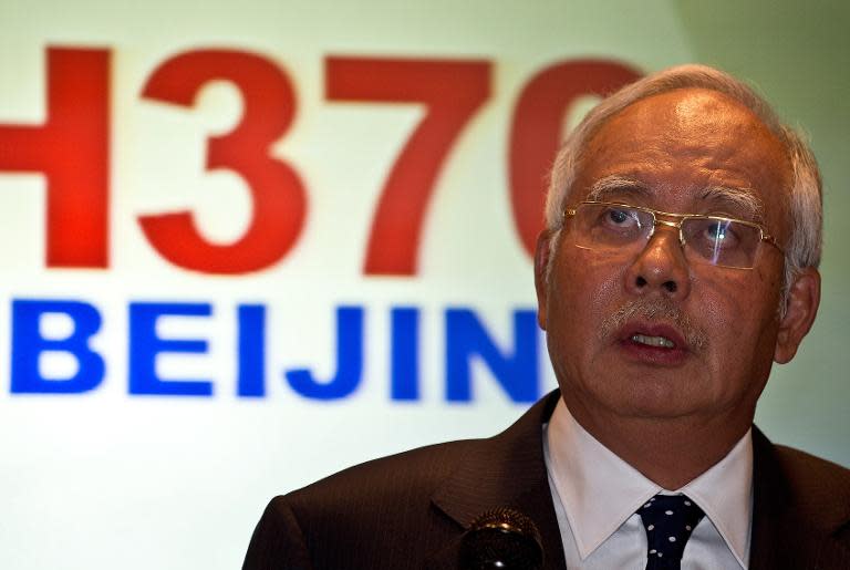 Malaysian Prime Minister Najib Razak addresses the media during a press conference at a hotel near Kuala Lumpur International Airport in Sepang on March 15, 2014