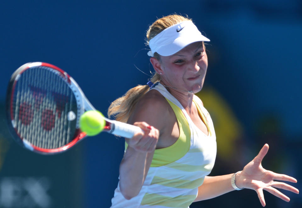 Donna Vekic of Croatia plays a return during her women's singles match against Denmark's Caroline Wozniacki on the fourth day of the Australian Open tennis tournament in Melbourne on January 17, 2013. 