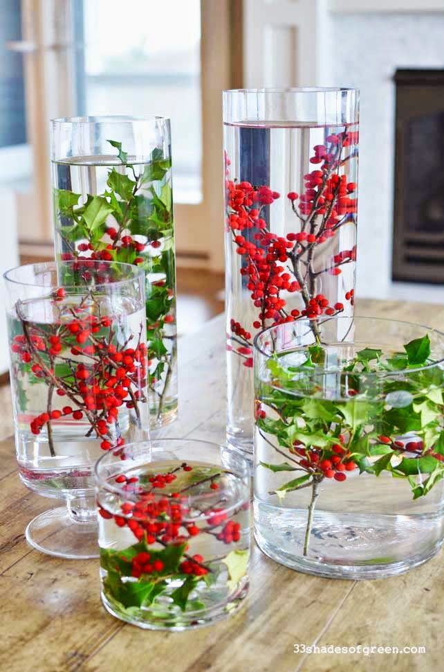 <p>These festive vases takes mere minutes. Simply fill various jars with water—stop just a few inches below the brim—and add American and Michigan holly. Purchase floating candles for an added glow.</p><p>Get the tutorial at <a href="http://www.33shadesofgreen.com/2014/11/easy-holiday-centerpieces.html" rel="nofollow noopener" target="_blank" data-ylk="slk:33 Shades of Green;elm:context_link;itc:0;sec:content-canvas" class="link ">33 Shades of Green</a>.</p>