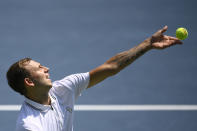 Daniel Evans, of England, serves to Brandon Nakashima during a match in the Citi Open tennis tournament, Wednesday, Aug. 4, 2021, in Washington. (AP Photo/Nick Wass)