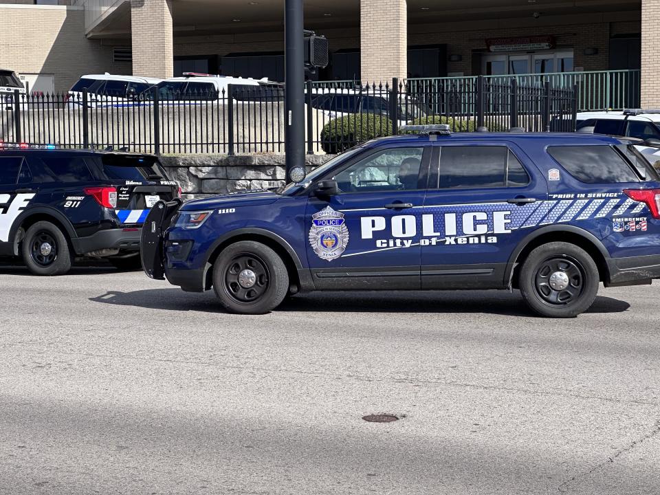 Dozens of officers and state troopers from across several cities in Montgomery and Greene counties gathered outside Miami Valley Hospital Tuesday as Officer Cody Cecil was released from Miami Valley Hospital five days after he was shot while serving a warrant in Clayton. (Scott Kessler/Staff)