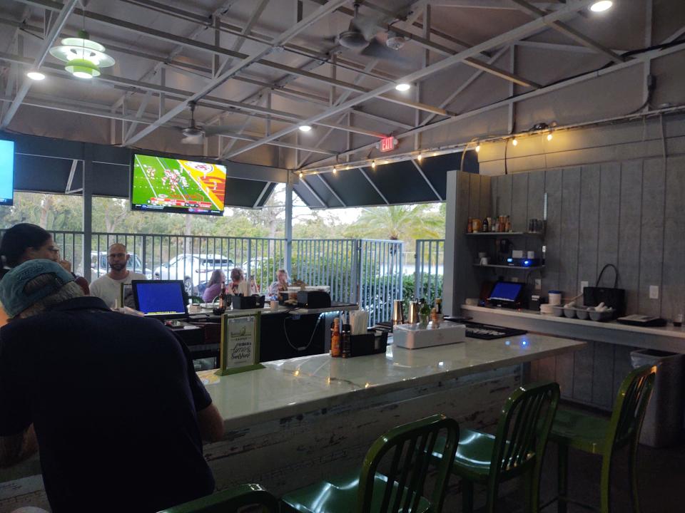 Twisted Lime in South Vero Square has two large bars: one inside and one outside.