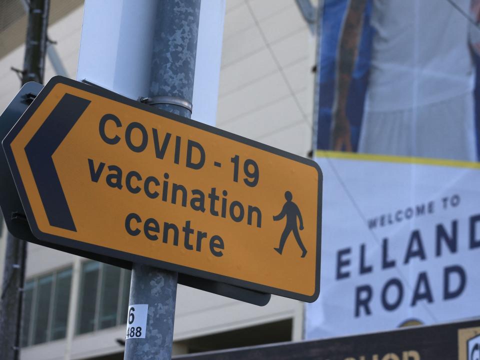 A street sign directs people to the Covid vaccination centre at Elland Road in Leeds (POOL/AFP via Getty Images)