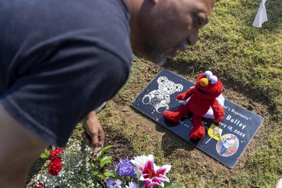 Montise Bulley, father of Justin Bulley, at his grave in Inglewood, Calif.