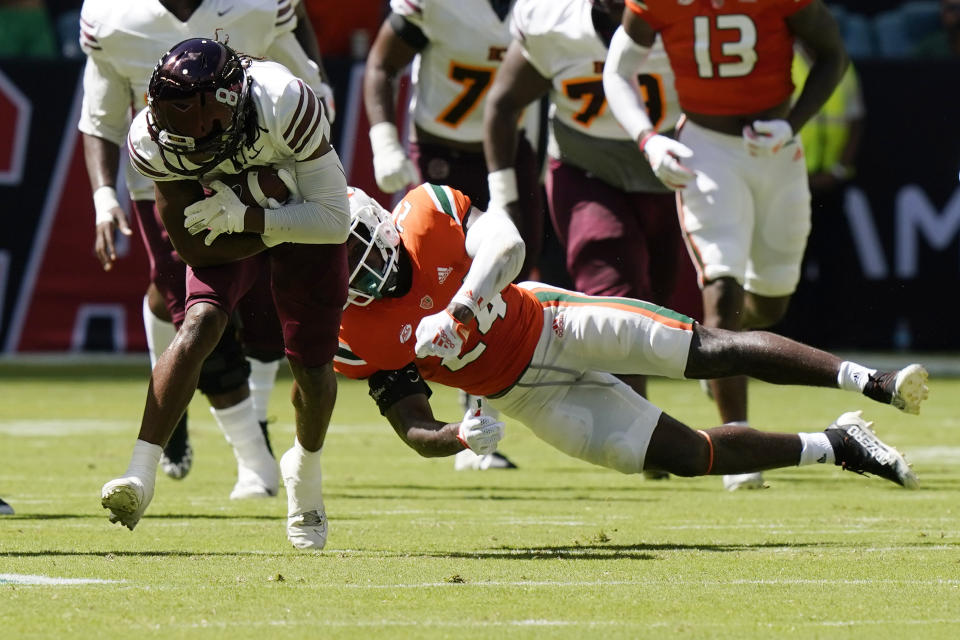 Bethune Cookman wide receiver Dylaan Lee, runs for a first down past Miami safety Kamren Kinchens (24) during the first half of an NCAA college football game, Saturday, Sept. 3, 2022, in Miami Gardens, Fla. (AP Photo/Lynne Sladky)