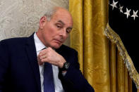 FILE PHOTO: White House chief of staff John Kelly listens as U.S. President Donald Trump meets with NATO Secretary General Jens Stoltenberg at the White House in Washington. U.S., May 17, 2018. REUTERS/Kevin Lamarque/Files