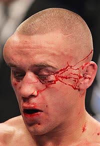 Mark Hominick took a beating from Jose Aldo but persevered through all five rounds