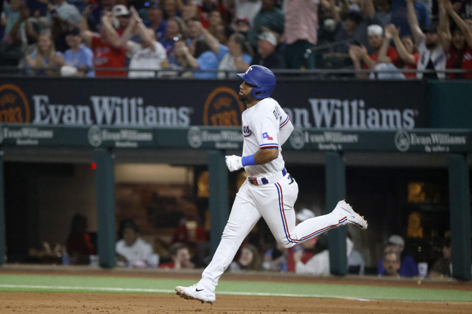 Texas Rangers' Ezequiel Duran runs the bases after hitting a two-run home run against the Arizona Diamondbacks during the sixth inning of a baseball game against the Texas Rangers, Tuesday, May 2, 2023, in Arlington, Texas. (AP Photo/Michael Ainsworth)