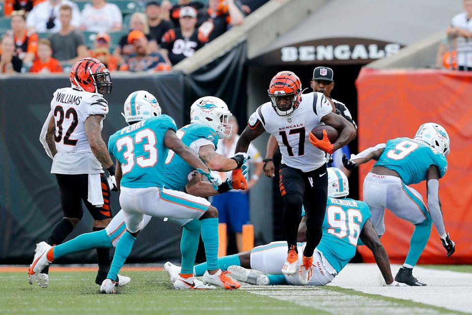 Cincinnati Bengals wide receiver Stanley Morgan (17) runs up the sideline on a reception in the third quarter of the NFL Preseason Week 3 game between the Cincinnati Bengals and the Miami Dolphins at Paul Brown Stadium in downtown Cincinnati on Sunday, Aug. 29, 2021. The Dolphins made a long touchdown drive in the fourth quarter to win 29-26.