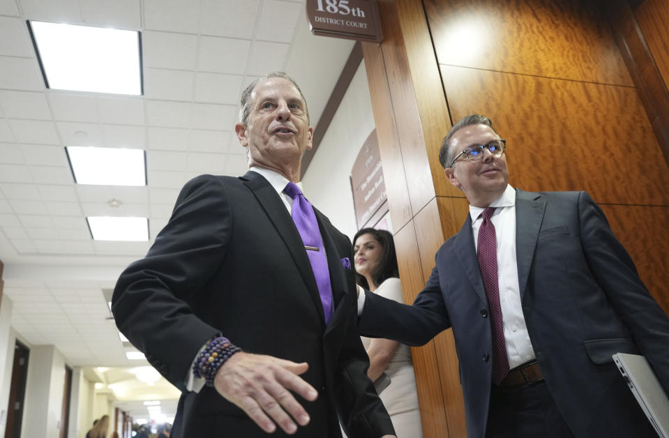 Special prosecutor Brian Wice makes his way to the 185th courtroom for suspended Texas Attorney General Ken Paxton's eight-year-old felony securities fraud case at the Harris County Courthouse on Thursday, Aug. 3, 2023 in Houston. Embattled Texas Attorney General Ken Paxton's years-delayed trial on securities fraud charges will have to wait until his separate impeachment trial is concluded, lawyers and the judge in the case said Thursday. (Elizabeth Conley/Houston Chronicle via AP)