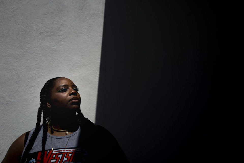 FILE - Black Lives Matter co-founder Patrisse Cullors stands for a portrait at Crenshaw Dairy Mart, an art gallery and studio space co-founded by Cullors, in Inglewood, Calif., April 19, 2022. The Black Lives Matter movement hits a milestone on Thursday, July 13, 2023, marking 10 years since its 2013 founding in response to the acquittal of the man who fatally shot 17-year-old Trayvon Martin. BLM co-founders Cullors, Alicia Garza and Ayo Tometi — the three activists are credited with using the phrase as an affirmation and an organizing strategy — initially pledged to build a decentralized organization governed by the consensus. (AP Photo/Jae C. Hong, File)