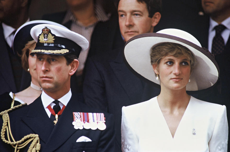 Prince Charles, Prince of Wales and Diana, Princess of Wales, wearing a white embroidered dress designed by Catherine Walker, a white hat designed by Marina Killery and a diamond Regimental brooch, attend the Gulf War Victory Parade at Mansion House on June 21, 1991 in London, United Kingdom. (Photo by Anwar Hussein/Getty Images)