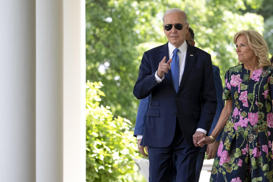 President Joe Biden and first lady Jill Biden walk from the Oval Office to attend a ceremony honoring the Council of Chief State School Officers' 2023 Teachers of the Year in the Rose Garden of the White House, Monday, April 24, 2023, in Washington. (AP Photo/Andrew Harnik)