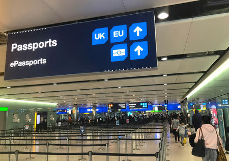 Signage is seen at the UK border control point at the arrivals area of Heathrow Airport, London, September 3, 2018. Picture taken on September 3. REUTERS/Toby Melville