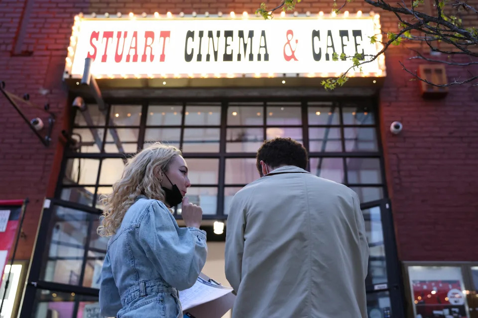 Movie fans fill out their award predictions before an Oscars watch party at the Stuart Cinema & Cafe, in Brooklyn, New York City on April 25, 2021. REUTERS/Caitlin Ochs