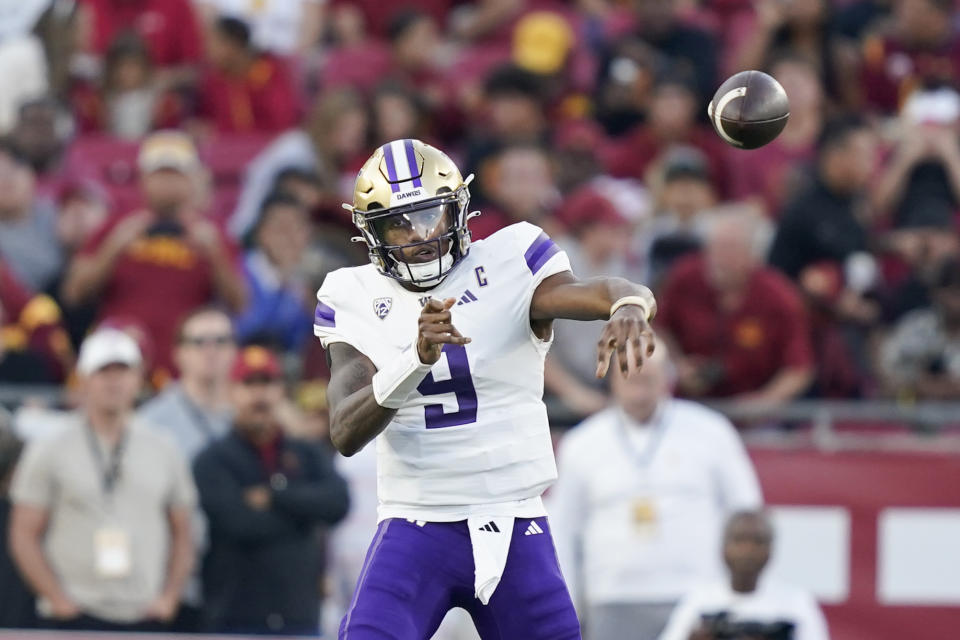 Washington quarterback Michael Penix Jr. throws a pass during the first half of the team's NCAA college football game against Southern California, Saturday, Nov. 4, 2023, in Los Angeles. (AP Photo/Ryan Sun)