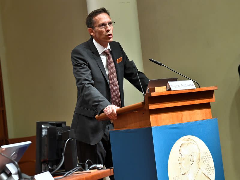 Perlmann, Secretary of the Nobel Assembly at Karolinska Institutet and of the Nobel Committee for Physiology or Medicine, announces Harvey J. Alter, Michael Houghton and Charles M. Rice as the winners of the 2020 Nobel Prize in Physiology or Medicine