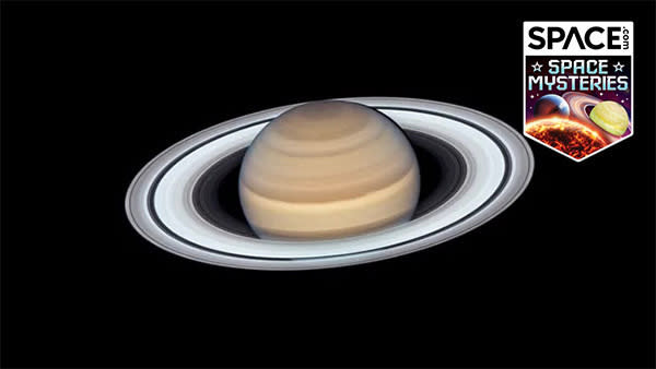  Photo of saturn and its rings against the blackness of space. 