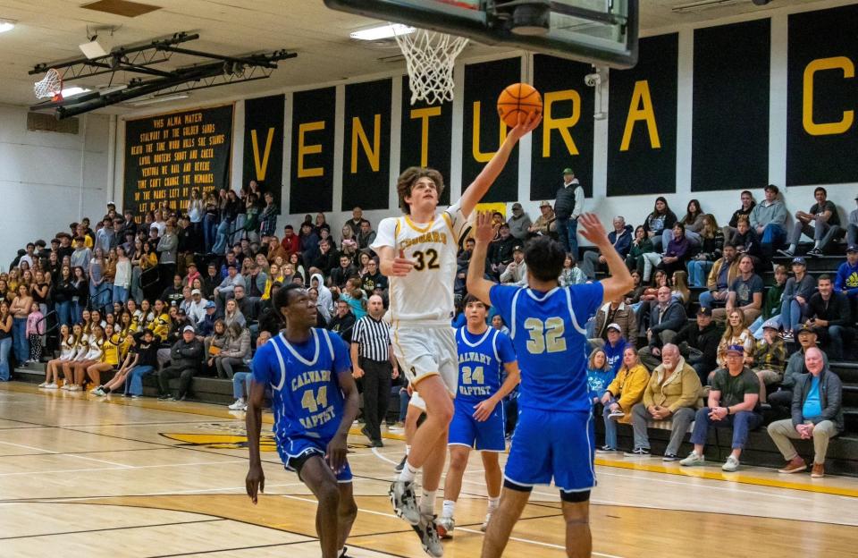 Ventura's Finn Fancher soars for a left-handed shot during the Cougars' 53-51 victory over Calvary Baptist in a CIF-SS Division 5AA second-round game at Ventura High on Friday, Feb. 9, 2024. Fancher scored with 2.5 seconds left to clinch the win.