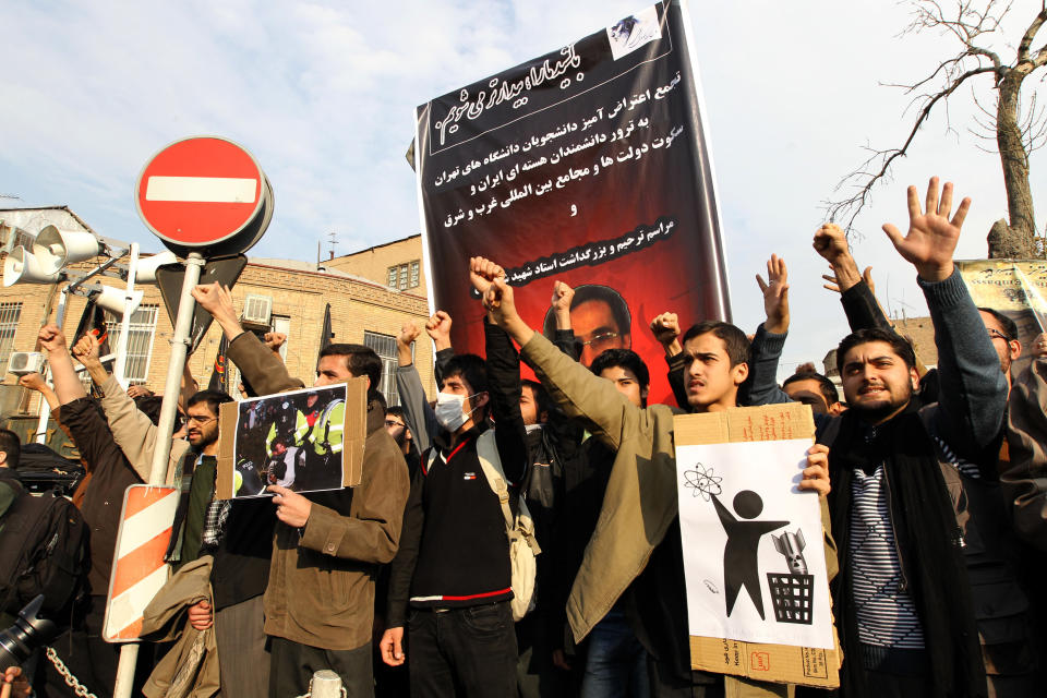 Dozens of basijis, members of Iran's hardline Islamist militia, demonstrate in front of Britain's embassy in downtown Tehran on Dec. 12, 2010 over the killing of a top Iranian nuclear scientist last month. Iranian leaders have pointed an accusing finger at the British intelligence service the MI6 as well as US and Israeli intelligence over the assassination. (Photo: Atta Kenare/AFP/Getty Images)