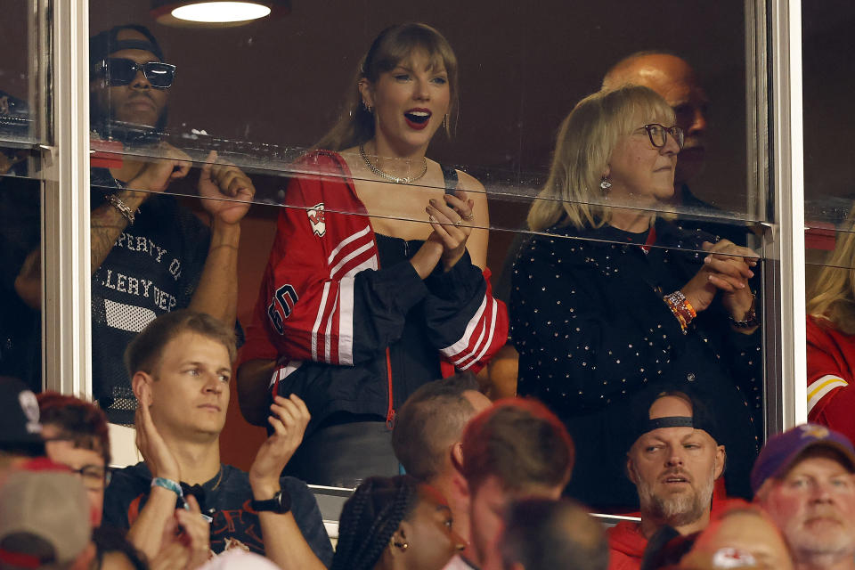 KANSAS CITY, MISSOURI - OCTOBER 12: Taylor Swift and Donna Kelce cheer before the game between the Kansas City Chiefs and the Denver Broncos at GEHA Field at Arrowhead Stadium on October 12, 2023 in Kansas City, Missouri. (Photo by David Eulitt/Getty Images)