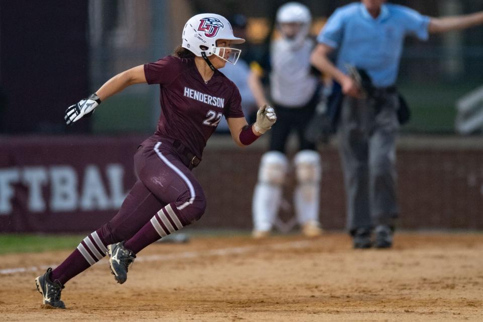 Henderson County’s Jamaya Byrum (22) runs to second base as the Henderson County Colonels’ play the Castle Knights in Henderson, Ky., Tuesday afternoon, April 11, 2023.