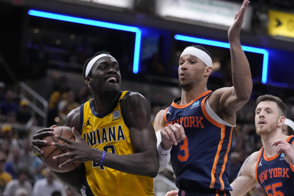 Indiana Pacers forward Pascal Siakam (43) drives past New York Knicks guard Josh Hart (3) during the second half of Game 4 in an NBA basketball second-round playoff series, Sunday, May 12, 2024, in Indianapolis. (AP Photo/Michael Conroy)