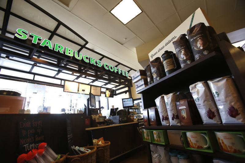 Coffee packages are pictured on display at a Starbucks Coffee store in Pasadena, California July 25, 2013. REUTERS/Mario Anzuoni