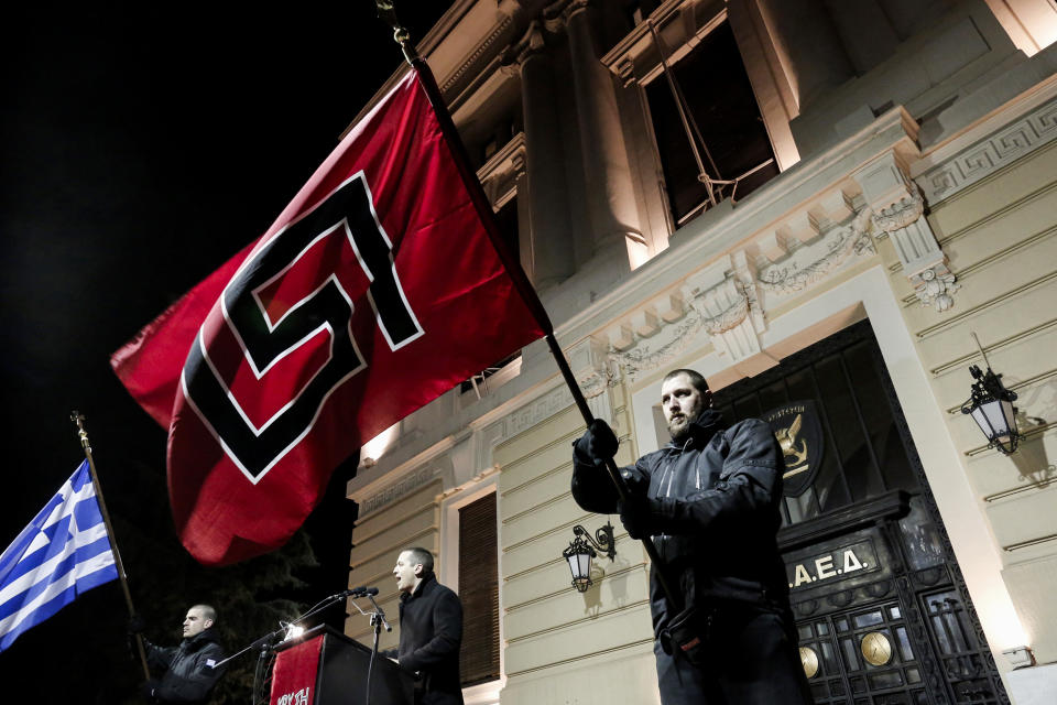 Ilias Kasidiaris, center, a lawmaker for the neo-Nazi Golden Dawn party, at a rally in Athens on Feb.1, 2014. (Yannis Kolesidis / AP file)