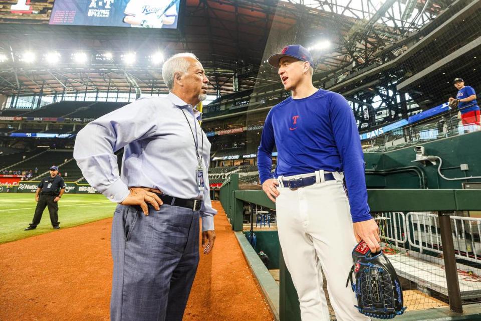 Eleno Ornelas, the spanish-language radio broadcaster for the Texas Rangers, speaks with Rangers pitcher Josh Suborn prior to a regular season game against the Tampa Bay Rays at Globe Life Field in Arlington, Texas on Wednesday, July 21, 2023.