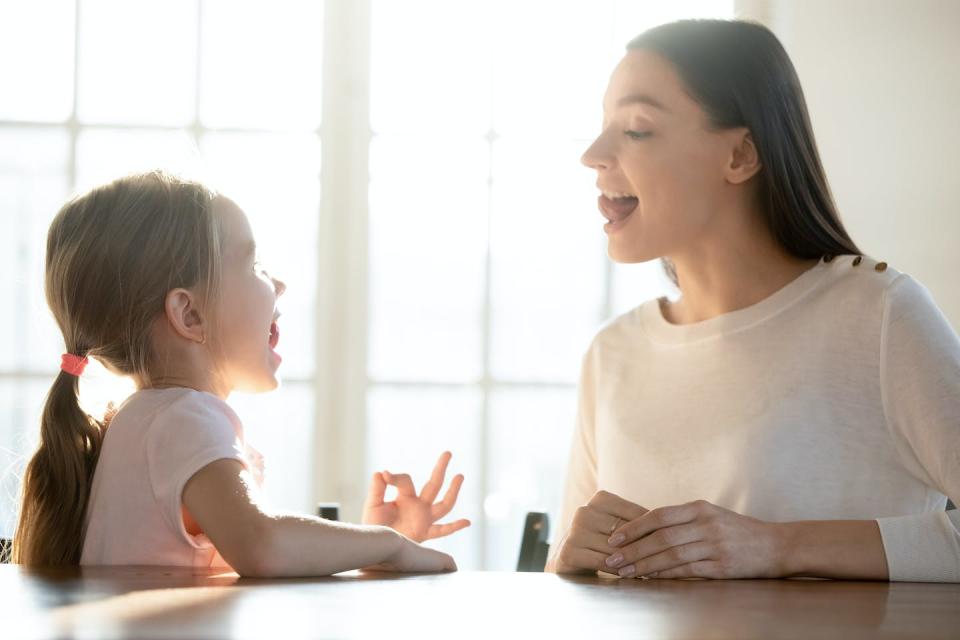 Speech-language pathologists help patients improve on their word retrieval abilities and speech. <a href="https://www.gettyimages.com/detail/photo/female-professional-help-small-kid-with-speech-royalty-free-image/1213336945" rel="nofollow noopener" target="_blank" data-ylk="slk:fizkes/iStock via Getty Images Plus;elm:context_link;itc:0;sec:content-canvas" class="link ">fizkes/iStock via Getty Images Plus</a>