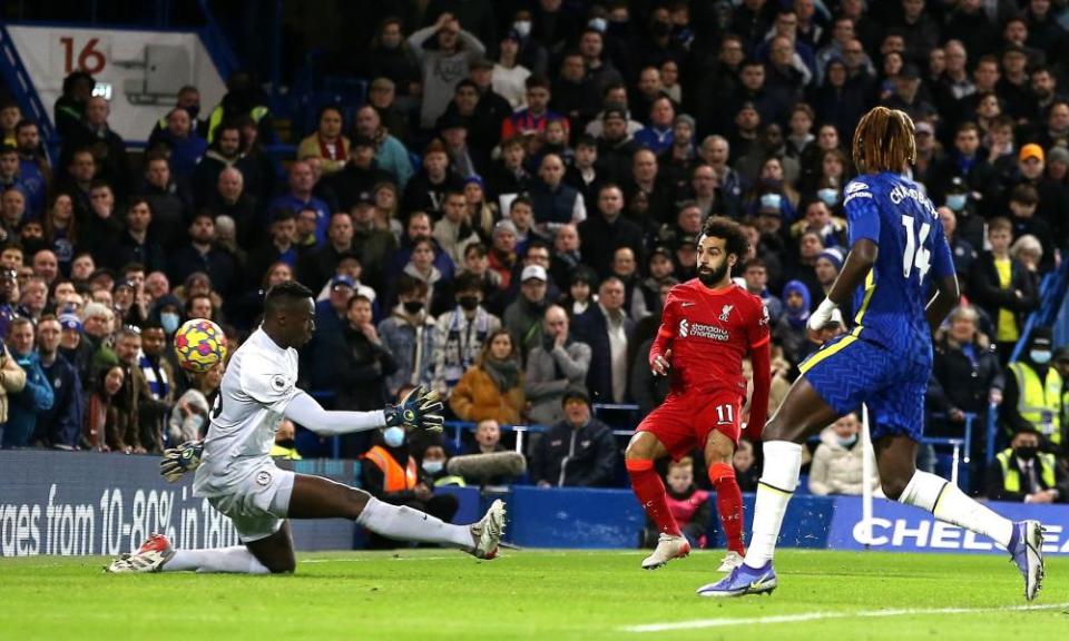 Mohamed Salah clips the ball over Édouard Mendy after a beautiful shimmy bewitched Marcos Alonso.