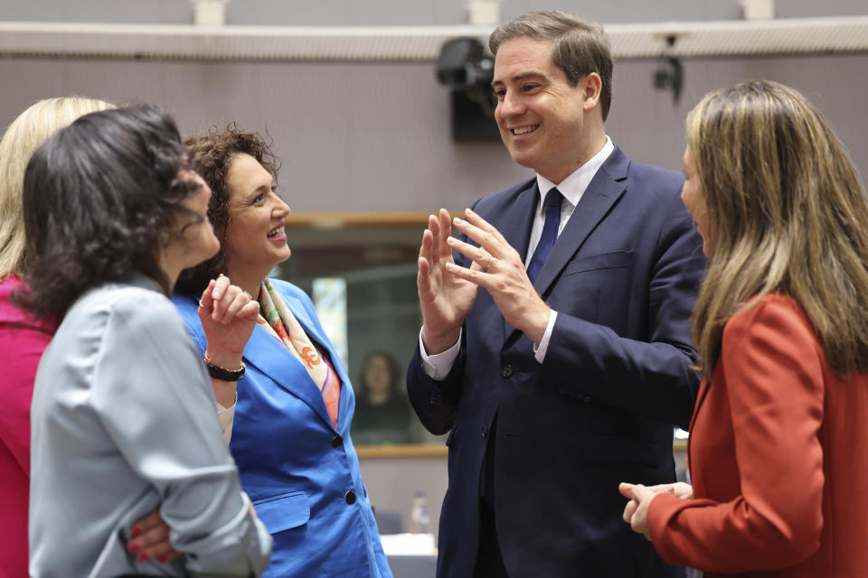 French Trade Minister Olivier Becht, second right, speaks with Spanish Secretary of State for Trade Xiana Mendez Bertolo, right, and Belgium's Foreign Minister Hadja Lahbib, left, during a meeting of EU trade ministers at the European Council building in Brussels, Thursday, May 25, 2023. European Union Trade Ministers meet in Brussels Thursday to discuss, among other issues, the state of play of the trade relations with the United States and recent developments in EU-China trade relations. (AP Photo/Geert Vanden Wijngaert)