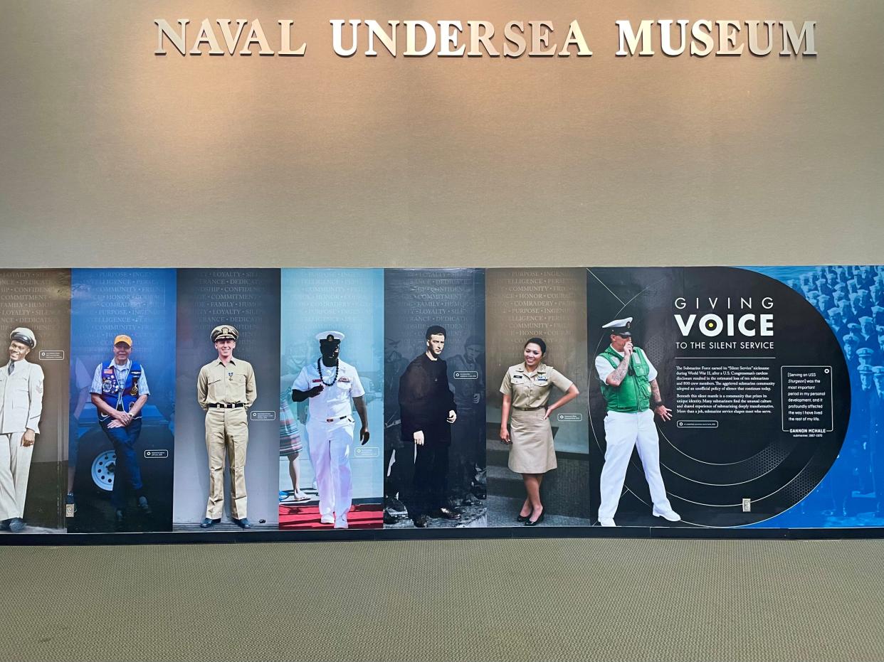 Submariners come from all walks of life. The front display of the U.S. Naval Undersea Museum's latest exhibit, "Giving voice to the Silent Service," documents the life of a submariner and how that has changed through time.