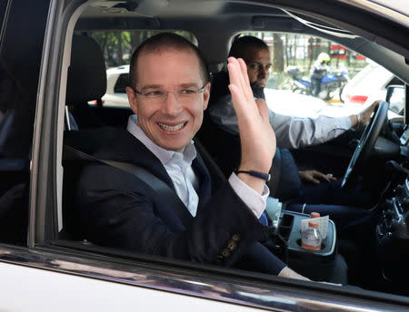 Ricardo Anaya, presidential candidate for the National Action Party (PAN), leading the left-right coalition "For Mexico in Front", greets media after leaving a hotel in Mexico City, Mexico March 20, 2018. REUTERS/Henry Romero