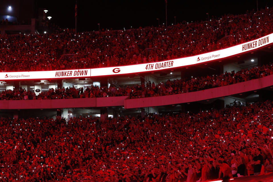 Georgia turns Sanford Stadium red at the beginning of the fourth quarter against Notre Dame in an NCAA college football game Saturday, Sept. 21, 2019, in Athens, Ga. (AP)