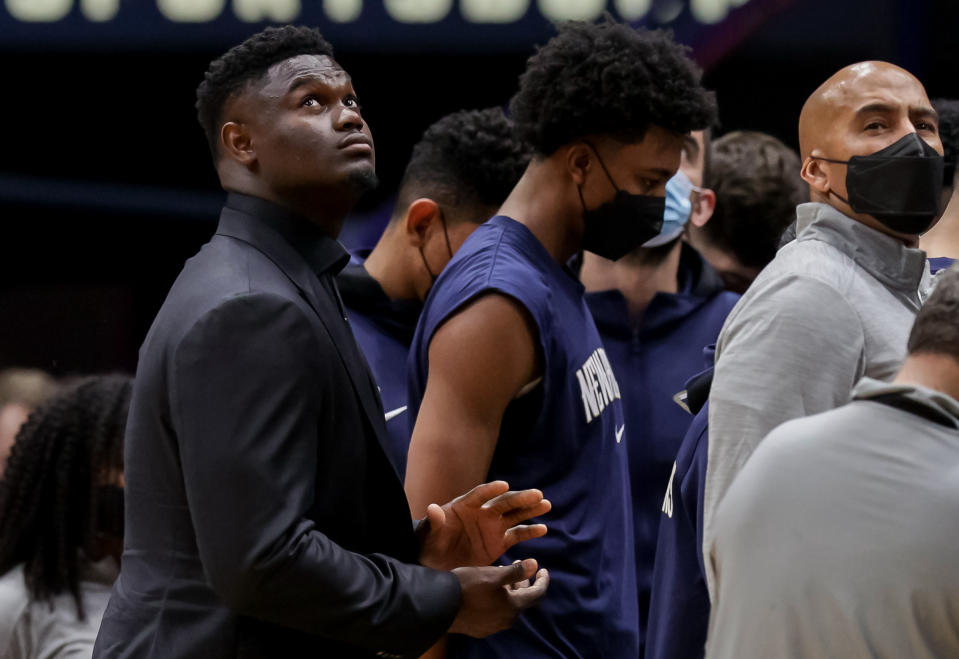 New Orleans Pelicans forward Zion Williamson (1) looks on during a time out against Philadelphia 76ers during the first half at Smoothie King Center. Mandatory Credit: Stephen Lew-USA TODAY Sports - 16992999