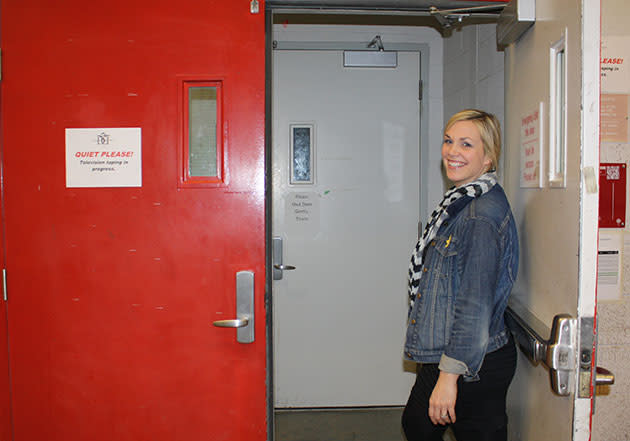 Dragons' Den senior producer Molly Middleton walks on to the set during the taping of the 2013-2014 season.