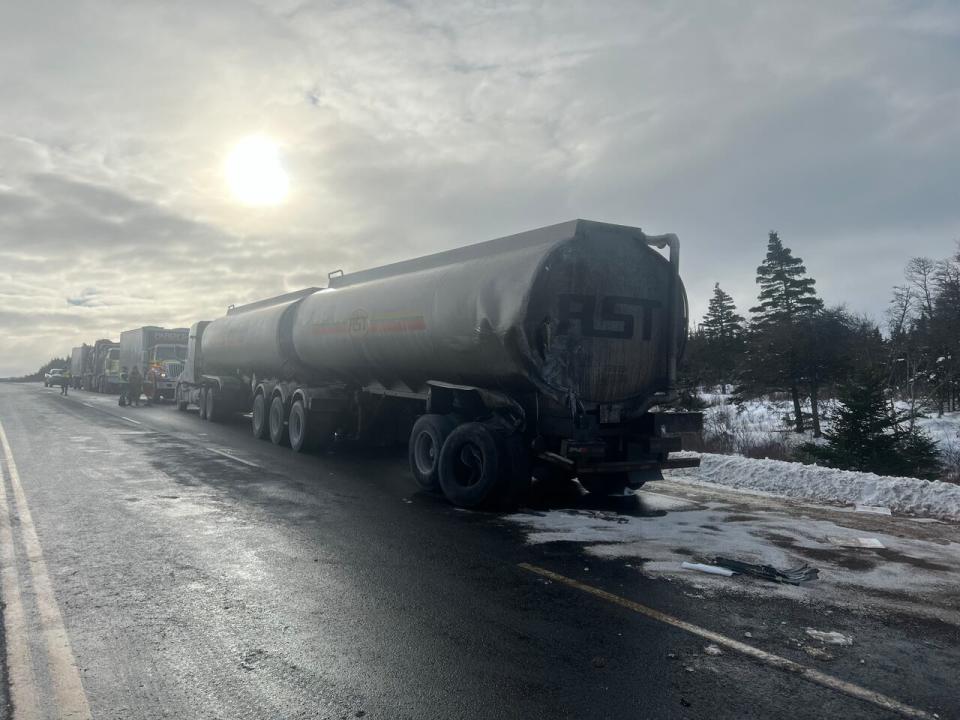 The RCMP in Whitbourne have closed a section of the Trans-Canada Highway due to a collision in which a large amount of fuel was spilled on the highway