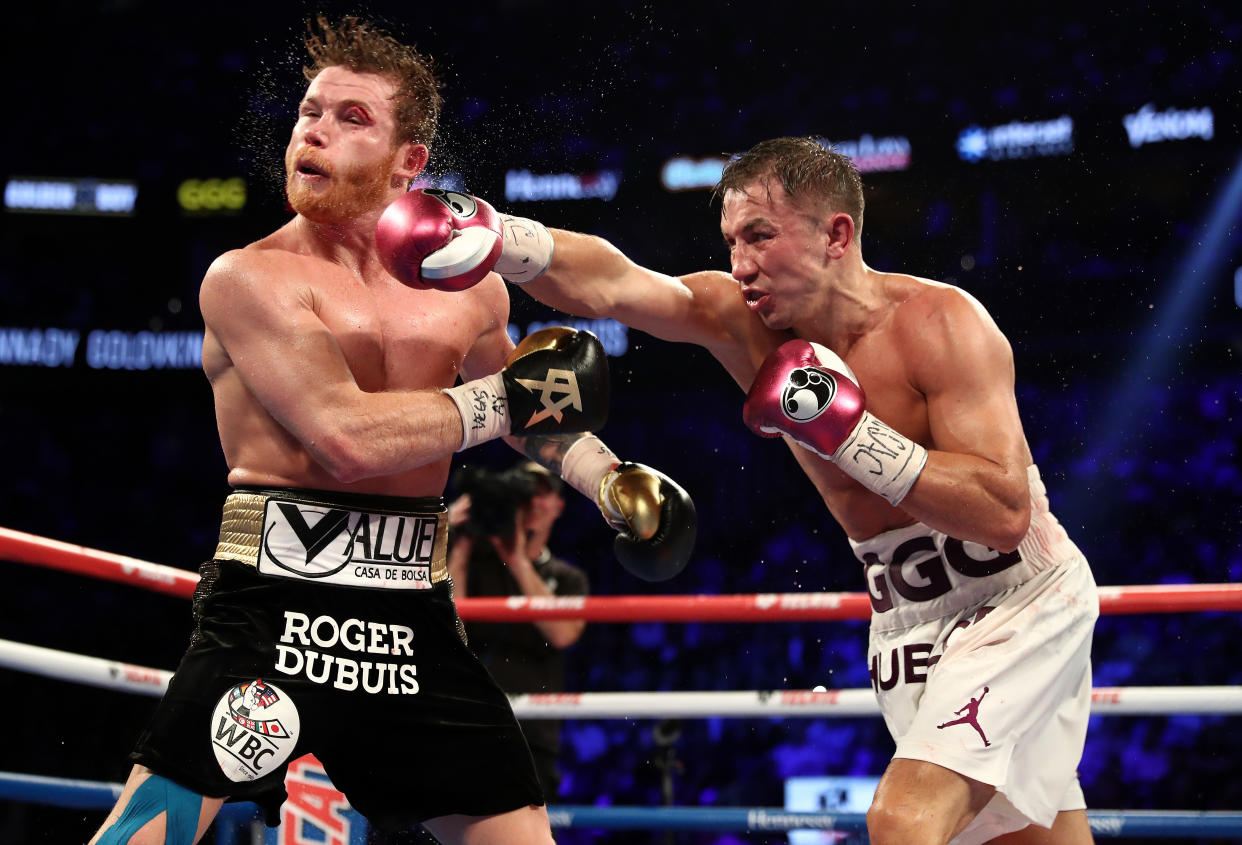 LAS VEGAS, NV - SEPTEMBER 15:  Gennady Golovkin punches Canelo Alvarez during their WBC/WBA middleweight title fight at T-Mobile Arena on September 15, 2018 in Las Vegas, Nevada.  (Photo by Al Bello/Getty Images)