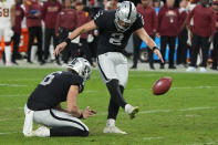 Las Vegas Raiders kicker Daniel Carlson (2) kicks a field goal during the second half of an NFL football game, Sunday, Dec. 5, 2021, in Las Vegas. (AP Photo/Rick Scuteri)