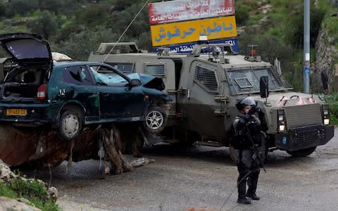 Early Monday, Israeli forces shot and killed two Palestinians who carried out a car-ramming attack - Credit: &nbsp;MOHAMAD TOROKMAN/&nbsp;REUTERS