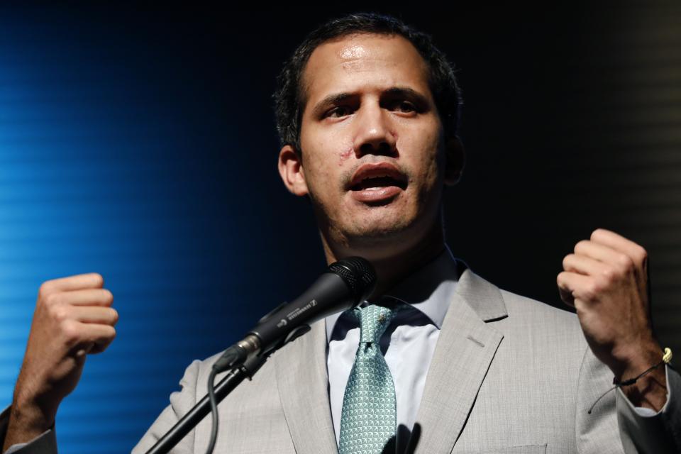 Venezuela's self proclaimed President Juan Guaido speak during Conindustria congress in Caracas, Venezuela, Wednesday, June 26, 2019. Jorge Rodríguez, spokesman for Venezuelan President Nicolas Maduro said Wednesday they have foiled a plot to overthrow the government that included assassinating President Nicolás Maduro and his closest political allies, and that plotters wanted to edge Guaidó from Venezuela’s political landscape. (AP Photo/Ariana Cubillos)