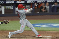 Los Angeles Angels' Logan O'Hoppe (14) hits a triple during the ninth inning of a baseball game against the Miami Marlins, Monday, April 1, 2024, in Miami. (AP Photo/Marta Lavandier)