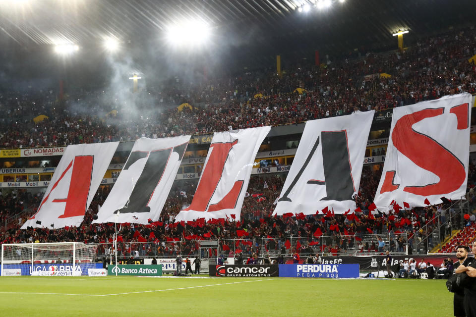 GUADALAJARA, MEXICO - MARCH 07: Fans of Atlas show giant letters to spell Atlas during the 9th round match between Atlas and Chivas as part of the Torneo Clausura 2020 Liga MX at Jalisco Stadium on March 7, 2020 in Guadalajara, Mexico. (Photo by Refugio Ruiz/Getty Images)